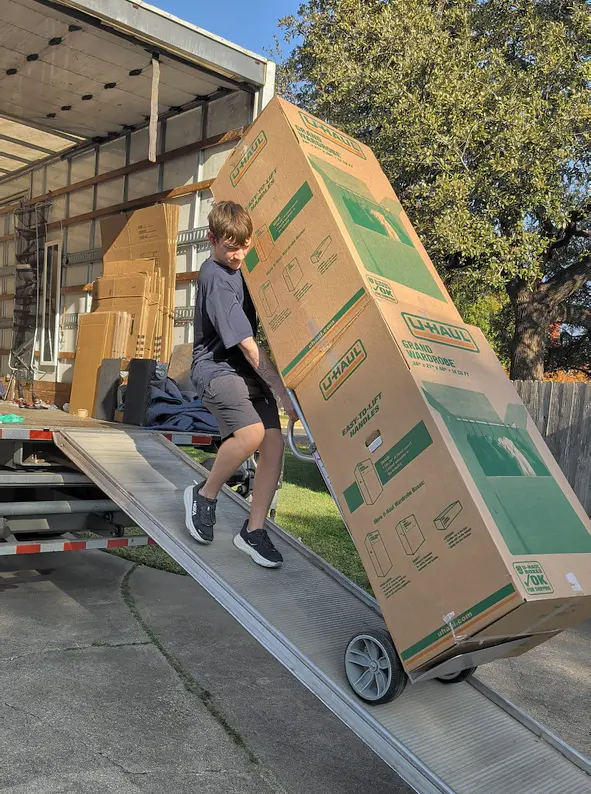 Unloading boxes from the moving truck